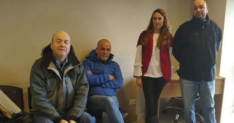  Integrantes del Tribunal y el abogado.