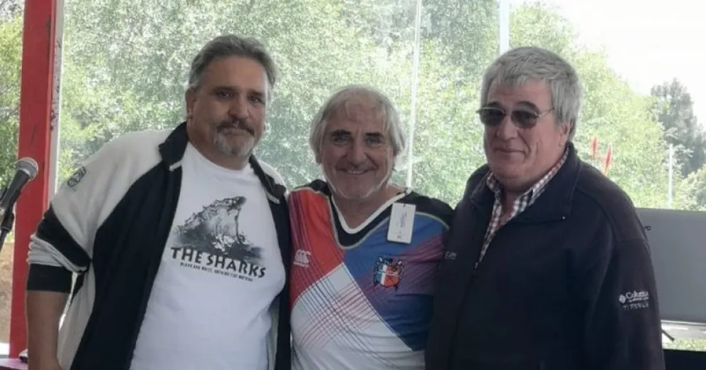  El ex entrenador Pacho Actis Perino junto a Martín Zeiss, capitán de la primera división.