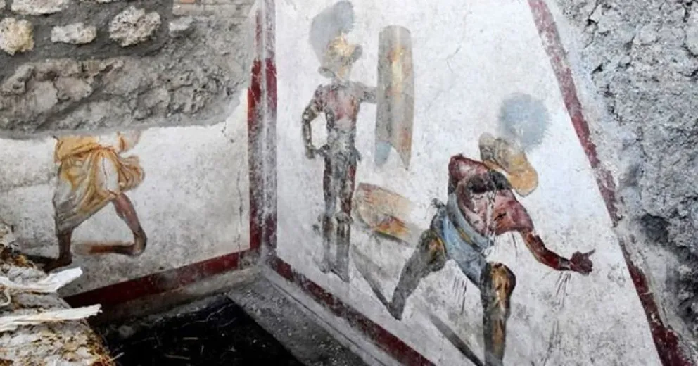 La increíble pintura de dos gladiadores que descubrieron en Italia
